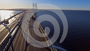 Drone span over high-speed road towards the new cable-stayed bridge in the early morning, northwest high-speed diameter