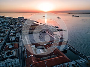 Drone sunset photo - Alfama District and the Comercio Square of Lisbon, Portugal