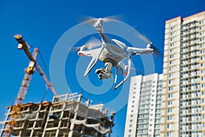 Drone survellance over construction area. building site inspection.