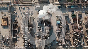 Drone top down footage of elements Oil and gas petrol fuel refinery petrochemical plant.