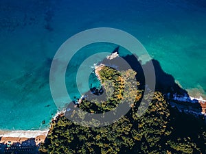 Drone top view of a sea cliff and a beach