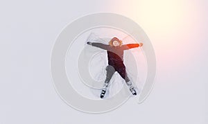 Top view snow angel man in december