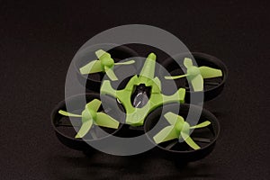 Drone toy green black background photo