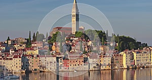 Drone video of the historic Croatian coastal town of Rovinj during sunrise