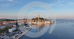 Drone video of the historic Croatian coastal town of Rovinj during sunrise