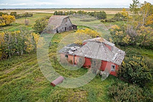 Drone view of abandoned farm buildings on the Canadian prairies
