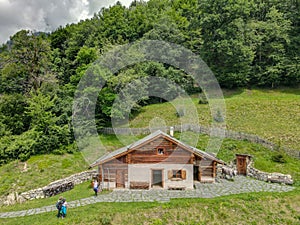 Drone view at the alp chalet of Heidi village over Maienfeld in the Swiss alps