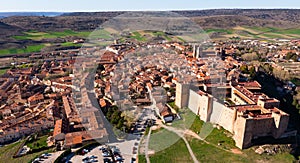 Drone view of ancient castle above residential areas in Siguenza photo