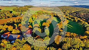 Drone view of autumn golf course in Germany.