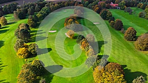 Drone view of autumn golf course in Germany.