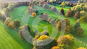 Drone view of autumn golf course in Germany.