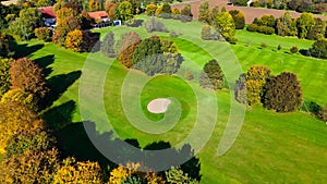 Drone view of autumn golf course in Germany.