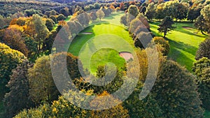Drone view of autumn golf course in Germany.