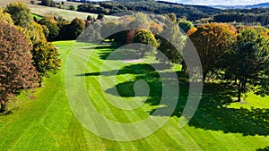 Drone view of autumn golf course in Germany.