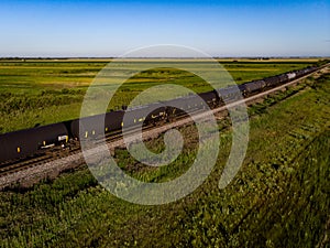 Drone View of Black Tank Cars on Prairie