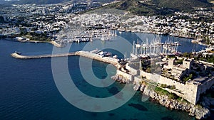 Drone view on Bodrum harbour and ancient Kalesi castle.