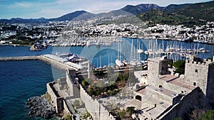 Drone view on Bodrum harbour and ancient Kalesi castle.