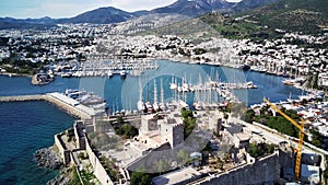 Drone view on Bodrum harbour and ancient Kalesi castle.