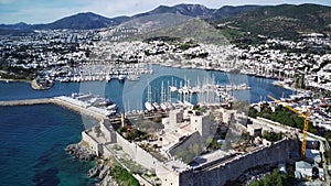 Drone view on Bodrum harbour and ancient Kalesi castle.