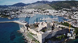 Drone view on Bodrum harbour and ancient Kalesi castle.