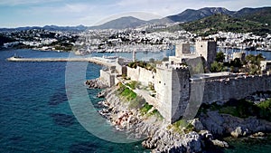 Drone view on Bodrum harbour and ancient Kalesi castle.