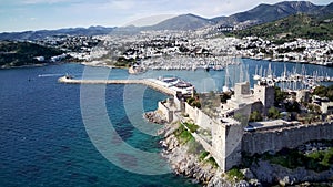 Drone view on Bodrum harbour and ancient Kalesi castle.