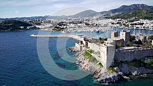 Drone view on Bodrum harbour and ancient Kalesi castle.