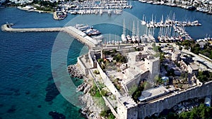 Drone view on Bodrum harbour and ancient Kalesi castle.