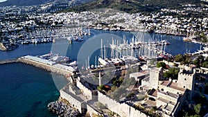 Drone view on Bodrum harbour and ancient Kalesi castle.