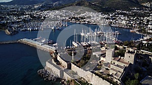 Drone view on Bodrum harbour and ancient Kalesi castle.