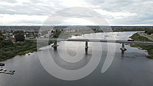 Drone view of a bridge over Daugava river in Daugavpils, Latvia, panoramic, 4k