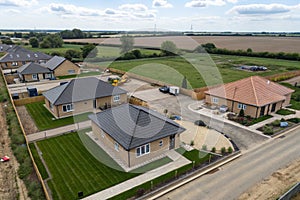 Drone view of bungalows in housing development