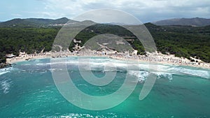 Drone view of Cala Agulla beach in Mallorca, Spain, on a hot summer day