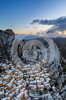 drone view of Castelmezzano at sunrise in winter