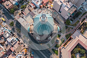 Drone view of a church in Lima, Peru. In the district of Magdalena del mar Drone orbits around the dome with statue of