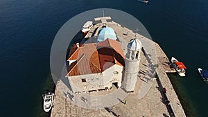 Drone view of the Church of the Our Lady of the Rocks on the island of Gospa od Skrpjela