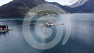 Drone view of the Church of Our Lady of the Rocks and Island of Saint George, Bay of Kotor near Perast