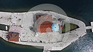 Drone view of the Church of Our Lady of the Rocks and Island of Saint George, Bay of Kotor near Perast