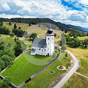 Drone View of the church, the Slovak geographical center of Europe in the locality of Kremnicke Bane in Slovakia