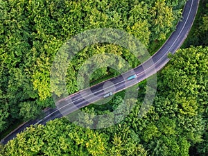 Drone view of a curved road in Transylvania, Romania