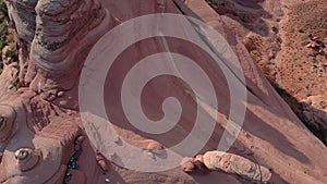 Drone view of a delicate arch and rock formations in Arches National Park in Utah