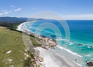 Drone view of Denison Beach north of the village of Bicheno, Tasmania, Australia