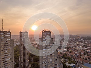Drone view of East Gate skyscrapers in Belgrade with sunset over Belgrade in the background