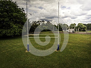 Drone view of goal posts in a rural school rugby field