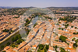 Drone view of Limoux summer cityscape on bank of river Aude , France