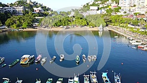 Drone view moving away from Manzanillo beach in Acapulco