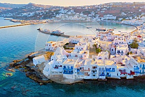 Drone view of Mykonos Greek village in Greece, colorful streets of Mikonos village