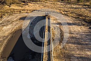 Drone view of old rusty railway track on an platform
