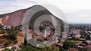 Drone view over the Tuscany cityscape before the Carrara marble mountain