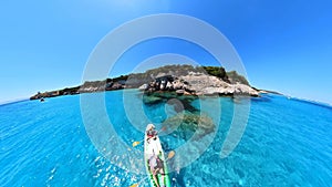Drone view of people kayaking in Corsica